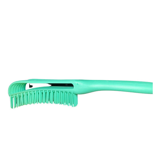 Green brush with comb on a white background