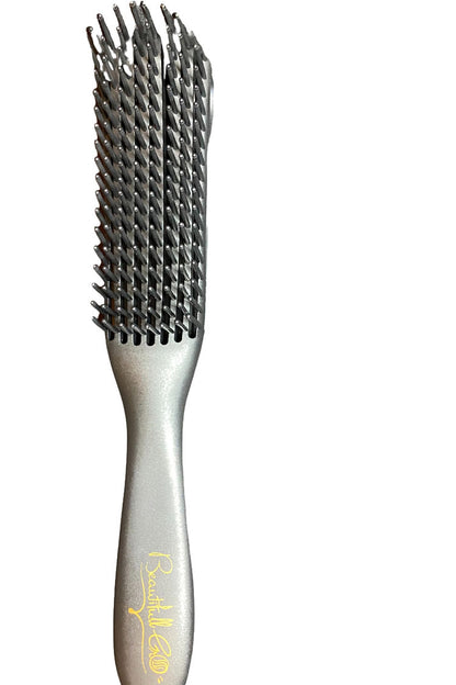 Hairbrush with bristle design on a white background