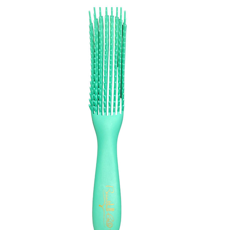 Green hairbrush on a white background