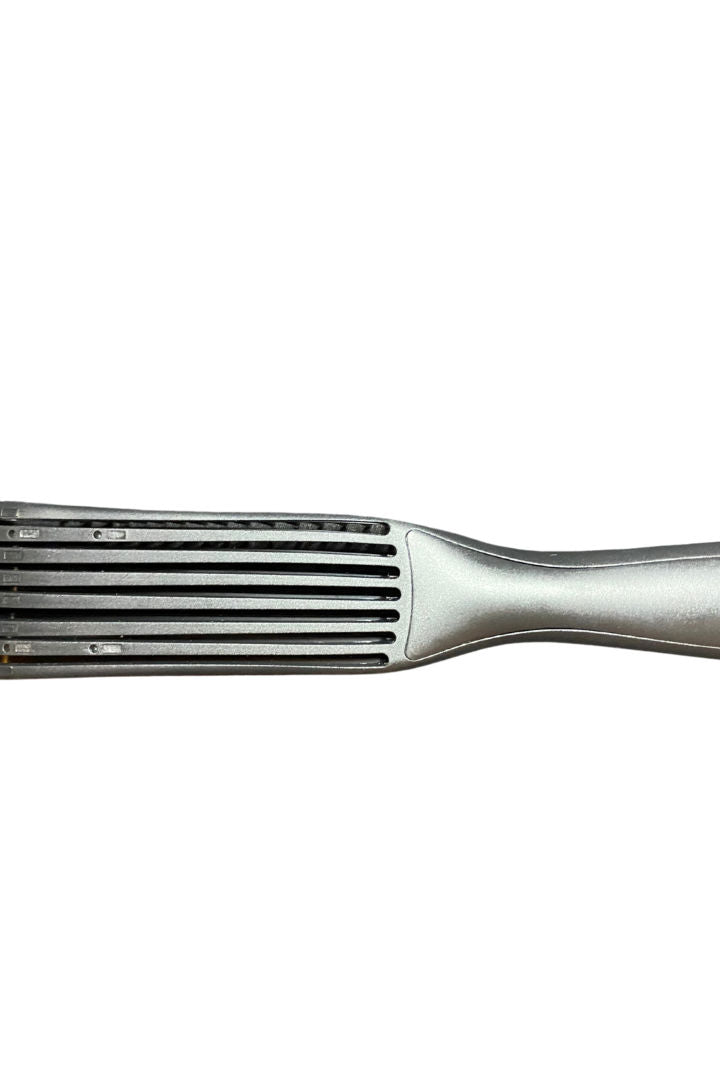 Metallic hair straightener on a white background