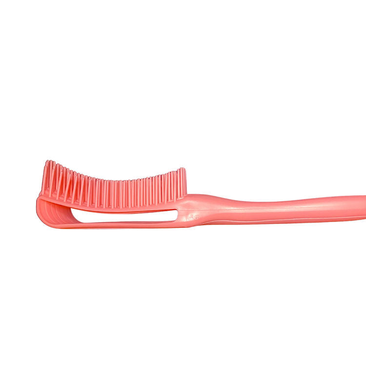 Pink toothbrush on a white background